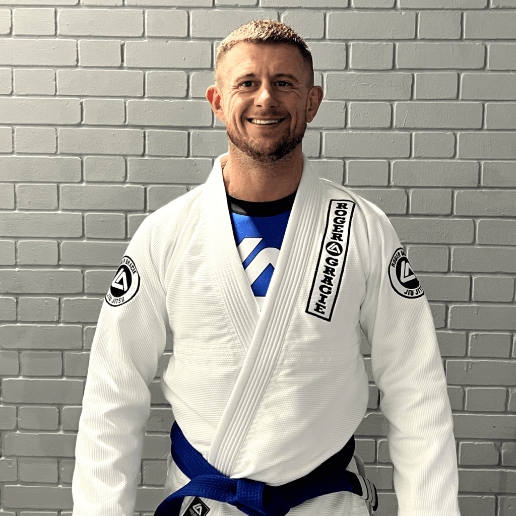 Blue belt male assistant coach