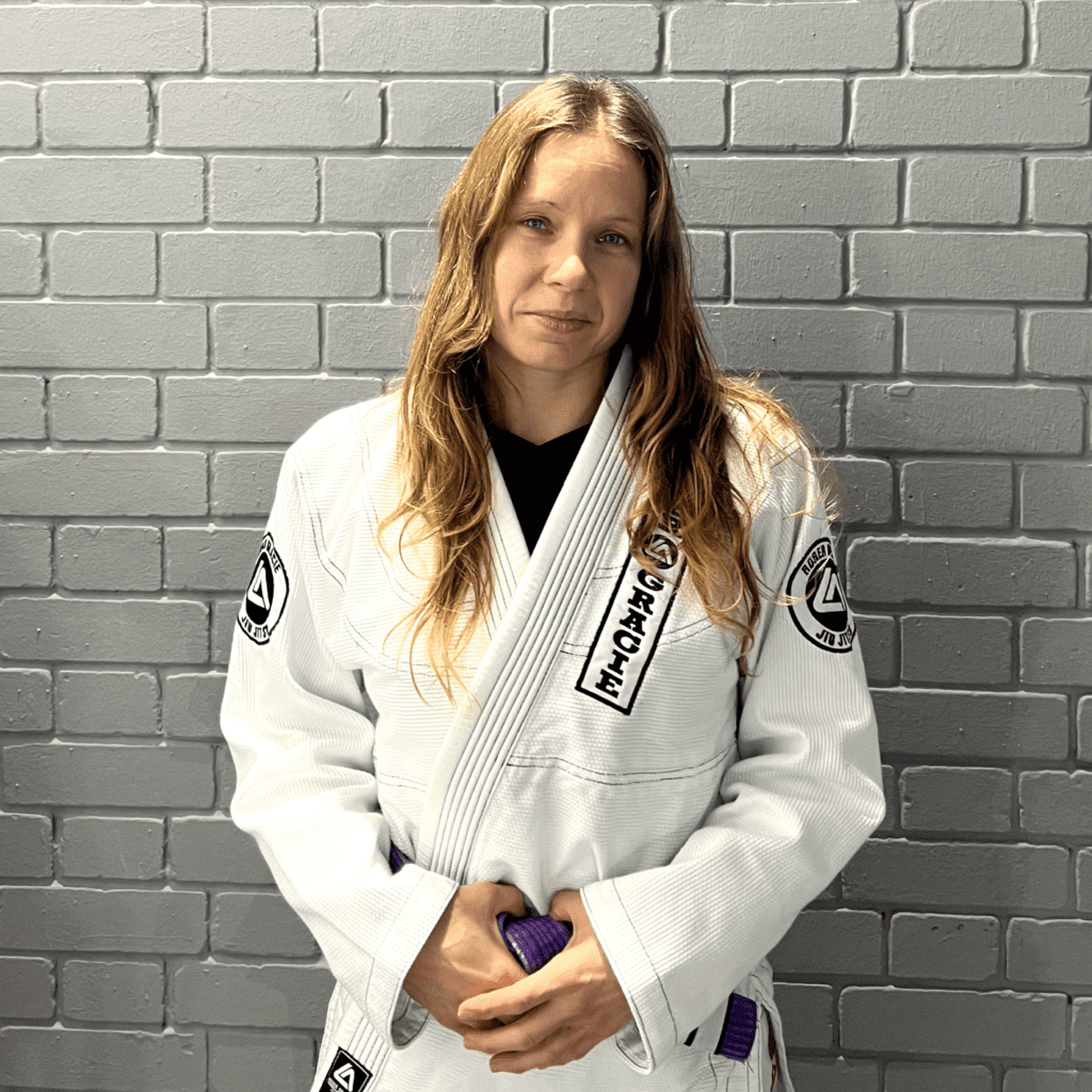 Purple belt assistant coach Emilia.